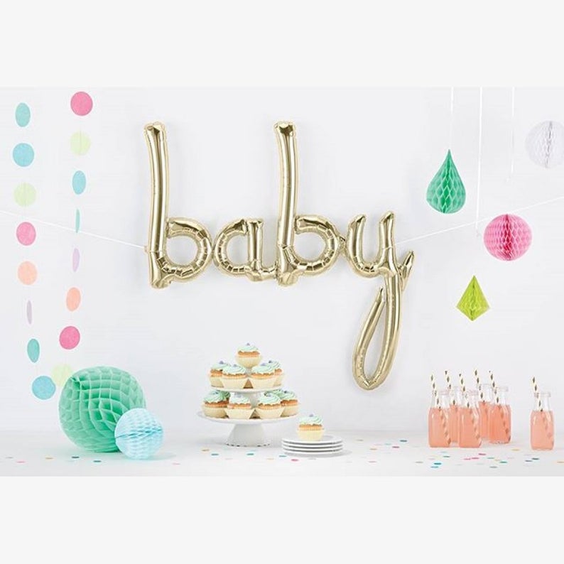 Air-Filled Gold Baby Cursive Letter Balloon Banner, 33in
